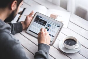 man reading from a tablet
