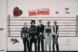 police lineup of four people with the words "The Usual Suspects"