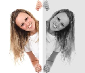 woman with mirror image; one in black and white and one in color