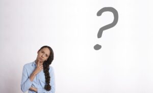 woman thinking with question mark