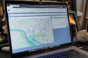 laptop with a map on the screen