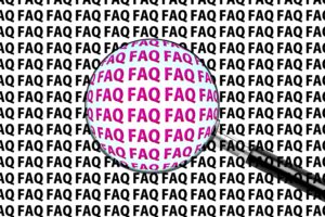 magnifying glass held over the word "faq" repeated throughout the background; the words under the magnifying glass are highlighted in a different color