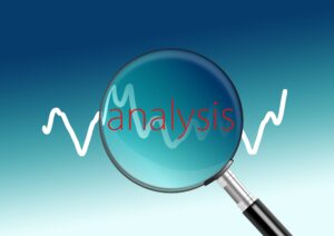 magnifying glass held over the word "Analysis"