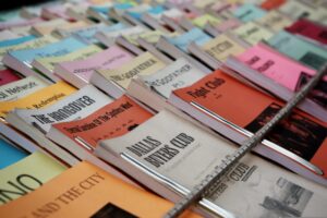 screenplays with prominent titles laid out on a table