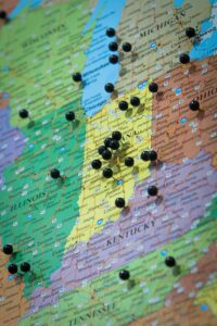 map with push pins at various towns