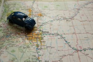paper roadmap with a toy Volkswagen on it