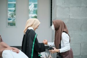 two people shaking hands