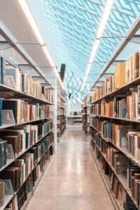 shelves of books classified in a library