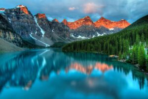 mountains with their outline reflected in a lake